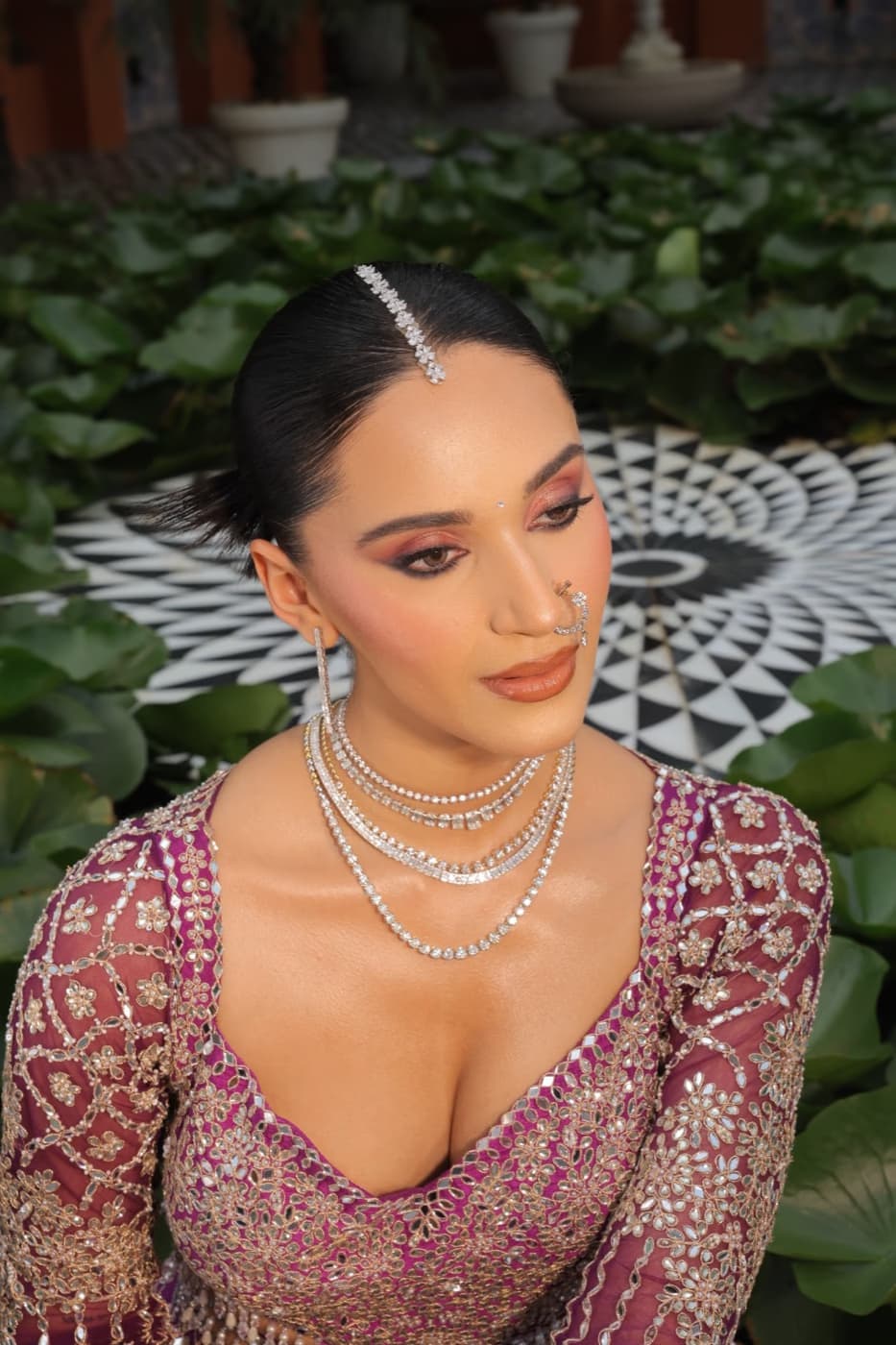 Wedding reception makeup and hair in Dubai by Elani Artistry, full glamour bridal look