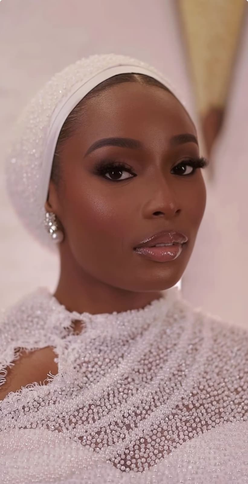 African Muslim bride in Sharjah with luminous deep-toned bridal makeup rich pigment bold eye and radiant skin finish by Elani Artistry