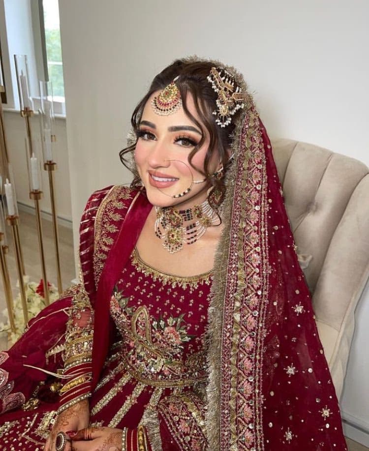 Pakistani bride at walima reception in Dubai with specialist bridal makeup by Elani Artistry