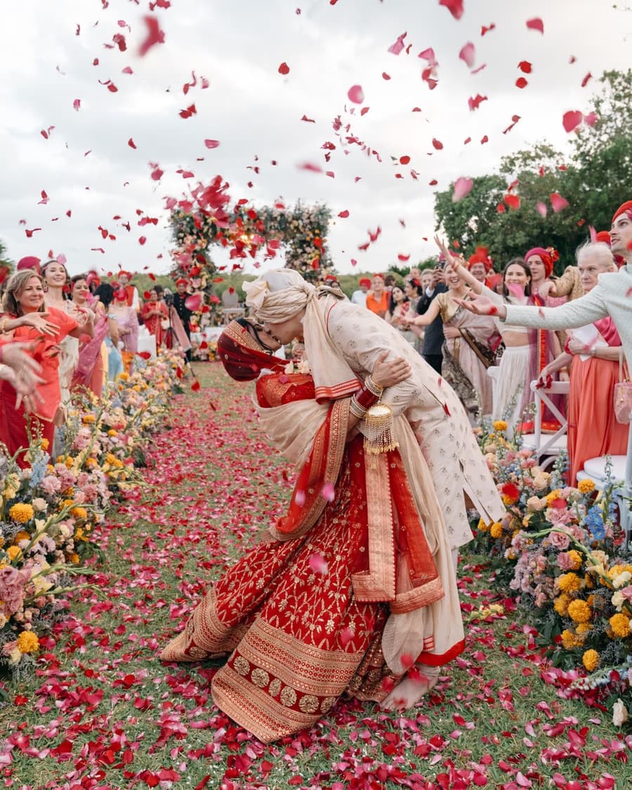 Indian bride and groom at a rose petal ceremony, destination wedding makeup by Elani Artistry travelling from Dubai