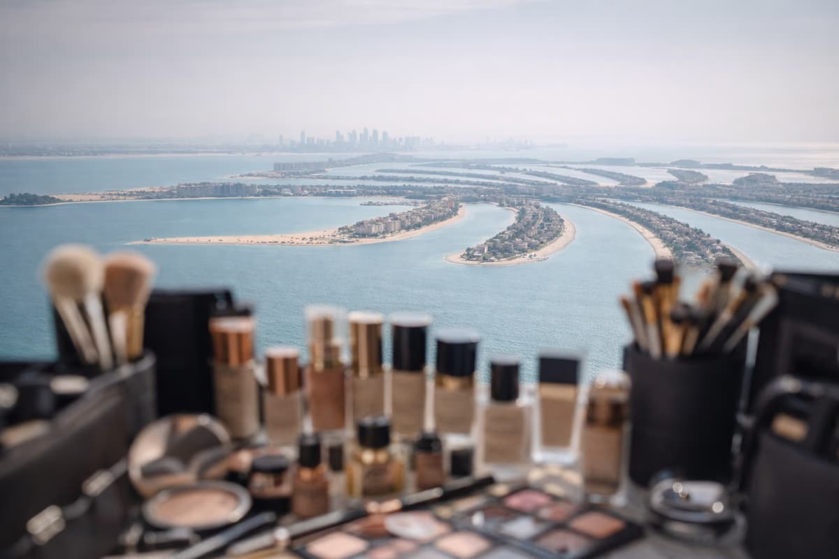 Luxury makeup kit with Palm Jumeirah Dubai view, Elani Artistry destination wedding makeup artist