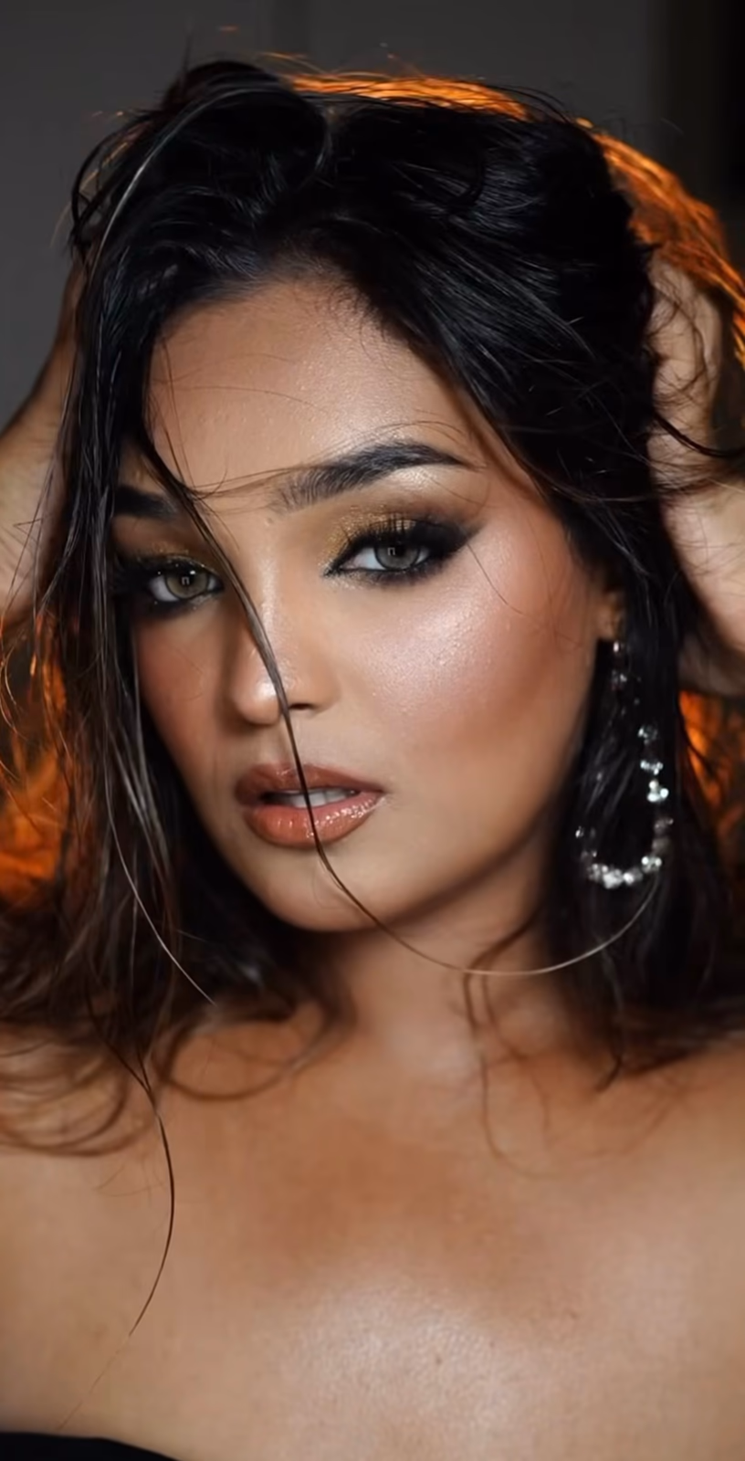Editorial makeup by Elani Artistry in Dubai, dramatic smoky eye and bronze glam for fashion campaigns