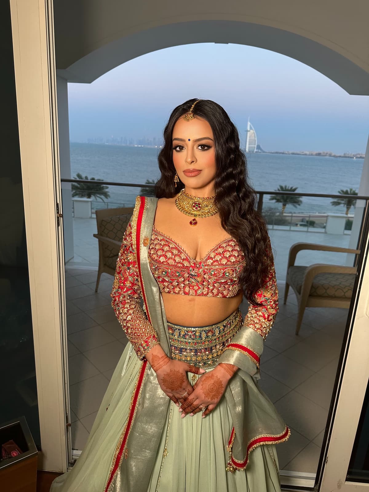 Indo-Western fusion bride in Dubai with contemporary editorial bridal makeup blending Indian and Western aesthetics by Elani Artistry