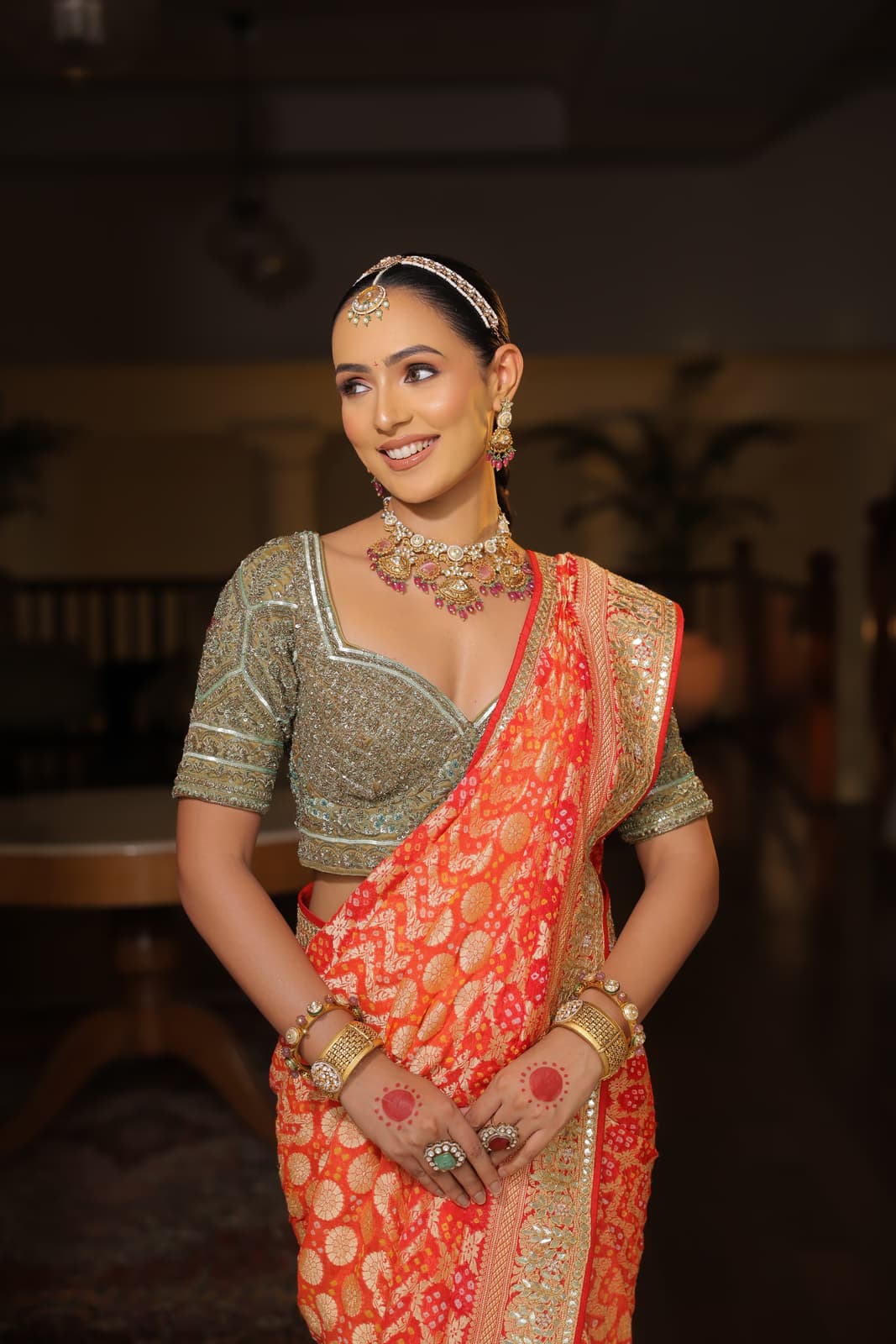 Tamil and South Indian bride in Dubai in silk Kanjeevaram saree with jasmine garlands and luminous traditional bridal makeup by Elani Artistry
